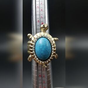 Cracked blue turquoise turtle ring adjustable stretch size. R135